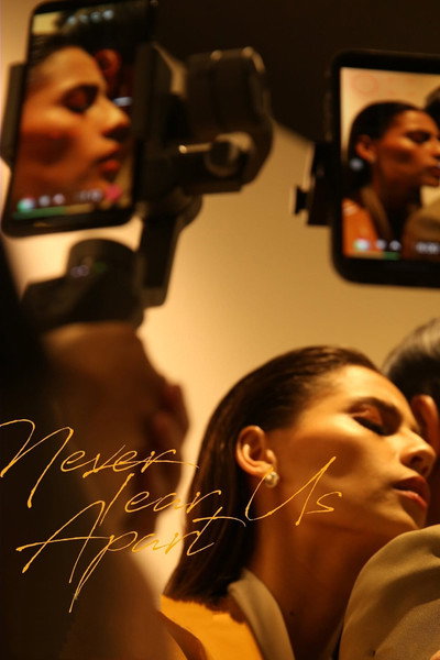 Póster de Never Tear Us Apart